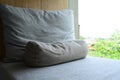 grey pillow put on bed in the room Royalty Free Stock Photo