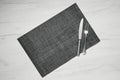 Gray placemat table mat with knife and fork