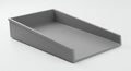 Gray plastic document tray with a rectangular shape and a slanted, open front for easy Royalty Free Stock Photo