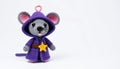 Gray Plush Mouse Wizard with Purple Robe and Golden Star on White Background Royalty Free Stock Photo
