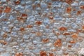 Gray and red stone wall in the mediterranean style texture Royalty Free Stock Photo