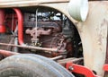 Gray and red tractor engine detail