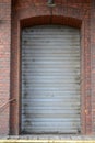 Gray roller door of an old building