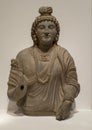 Gray schist stone bust of a Bodhisattva on display in the Dallas Museum of Art in Dallas, Texas.