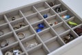 gray sectional velor jewelry box with earrings, bracelets and rings Royalty Free Stock Photo