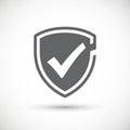 Gray shield icon with a white checkmark. The shield has a simple Royalty Free Stock Photo