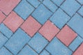 Gray sidewalk tile street stone city road abstract urban pattern color red blue pink design texture paving background Royalty Free Stock Photo
