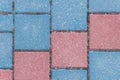 Gray sidewalk tile street stone city road abstract urban pattern color red blue pink design texture paving background Royalty Free Stock Photo