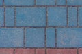 Gray sidewalk tile street stone city road abstract urban pattern color red blue pink design texture paving background Royalty Free Stock Photo
