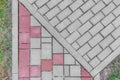 Gray sidewalk tile street stone city road abstract urban pattern color red or pink design texture paving background Royalty Free Stock Photo