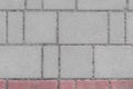 Gray sidewalk tile street stone city road abstract urban pattern color red or pink design texture paving background Royalty Free Stock Photo