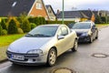 Gray silver black passenger cars vehicles in parking lot Germany