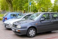 Gray silver blue passenger cars vehicles in parking lot Germany