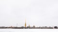 gray sky over frozen Neva river and Fortress