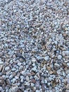 Gray small rocks ground texture. black small road stone background. Royalty Free Stock Photo