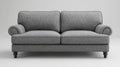 Comfortable Grey Sofa Armchair with Rolled Arms and Detailed Fabric Texture Royalty Free Stock Photo