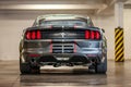 Gray sports Ford Mustang in the garage