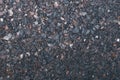 Gray stone background. Abstract pattern of gravel. Natural road texture. Rock material. Grunge floor on street. Small brown and gr Royalty Free Stock Photo