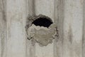Gray stone texture of concrete wall with a hole Royalty Free Stock Photo