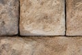 Gray stone background large blocks. Old cobblestone wall weathered