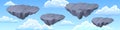 Gray stone floating islands in sky with clouds