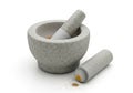 Gray stone mortar and pestle set, with a rough texture, sits on a white background. Royalty Free Stock Photo