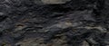 Gray stone texture, dark abstract background. Natural mineral rock close up details, empty backdrop