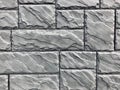 Gray stone wall, large brick masonry with seams Royalty Free Stock Photo