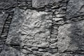 A gray stone wall texture with light on one side Royalty Free Stock Photo