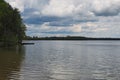 Gray storm clouds over the forest and lake. Pisochne ozero. Volyn region. Ukraine Royalty Free Stock Photo