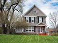 Gray Stucco House with Black Shutters