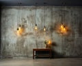 Gray studio background with simple furniture and burning electric lamps