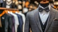 Gray suit with bow tie on mannequin in a tailoring atelier Royalty Free Stock Photo