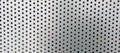 Gray surface with pattern of round black cutout holes, texture, background Royalty Free Stock Photo