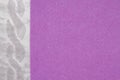 Gray textured plush and purple felt fabric material background