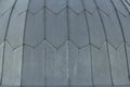 Gray tile roof floor background. Closeup roofing texture pattern. Materials to build a house for sun and rain protection. White