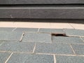 Gray tiles with cracks, floor collapses, cracked house problems