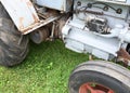 Engine details of a gray tractor