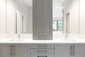 A grey vanity in a luxurious bathroom. Royalty Free Stock Photo