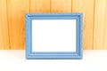 Gray Vintage picture frame on wood background