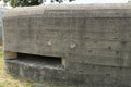 Gray wall of a large old military bunker