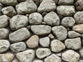 Gray wall from large stones background texture, grey stone slate wall concrete grout, rock Royalty Free Stock Photo