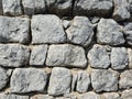 Gray wall from large stones background texture, grey stone slate wall concrete grout, rock Royalty Free Stock Photo