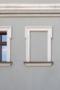 Gray wall with white window frame bricked up. Being in isolation, silence and hidden area. Concept