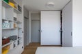 Gray wardrobe closets in bedroom