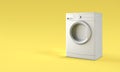 Gray washing machine on a yellow background