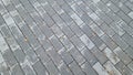 Gray wet paving slabs in the fall. View from above Royalty Free Stock Photo