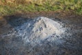Gray white ash ashes pile heap stack from burnt campfire lumber Royalty Free Stock Photo