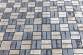 A gray and white brick patterned sidewalk Royalty Free Stock Photo