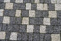 Gray white colored square and rectangle paving stone, tiled stone texture Royalty Free Stock Photo